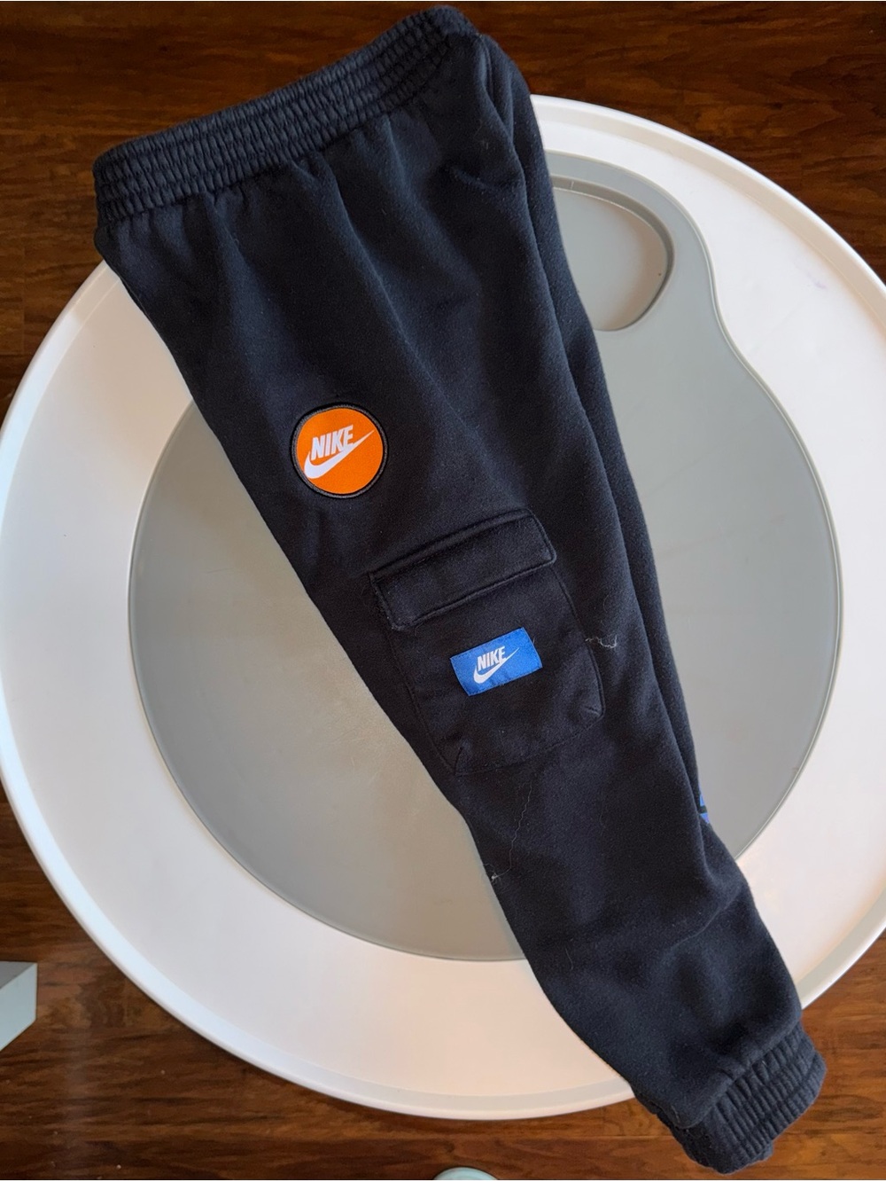 Nike Kids Black Sweatpants with Orange and Blue Logo Patches